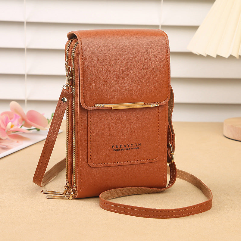 👜📱 Simple and elegant touchscreen phone bag for women, designed to be worn over the shoulder.